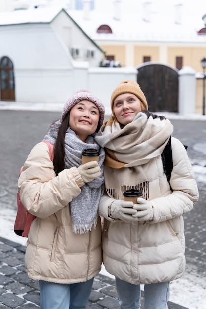 Friends traveling together in winter time