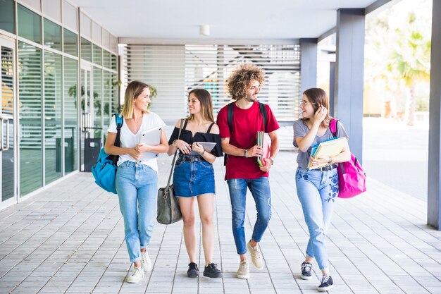 Friends walking from studies together