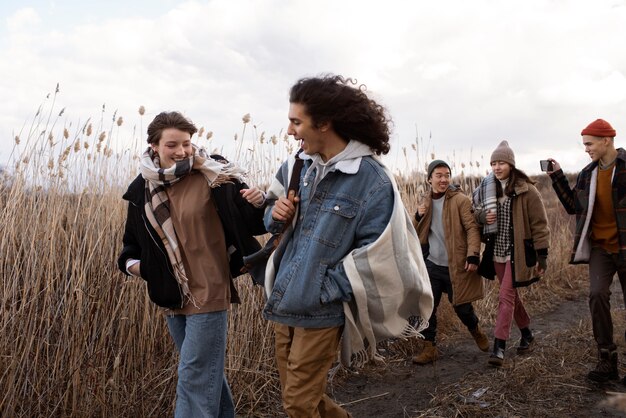 Friends walking together medium shot