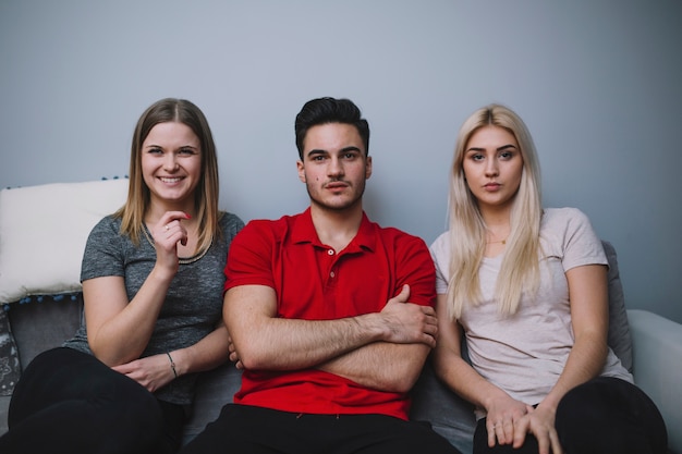 Friends watching Tv together