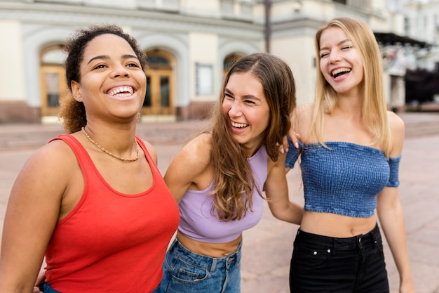 Friends wearing casual clothes and laughing