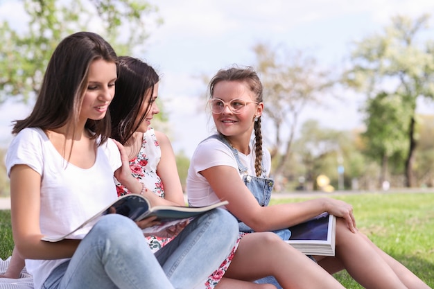 Friendship. Women in park during the day