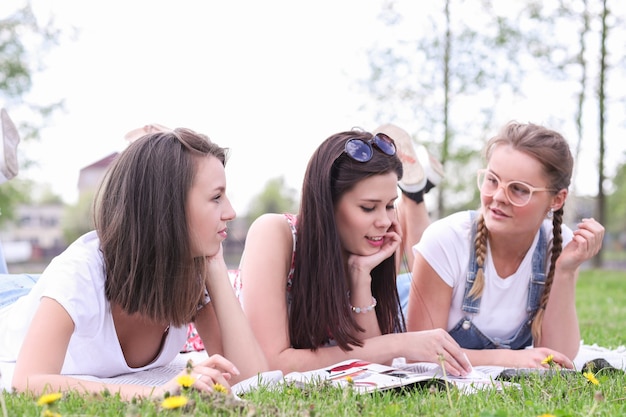 Friendship. Women in park during the day