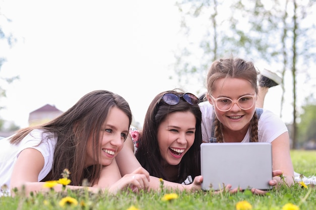 Friendship. Women in park during the day