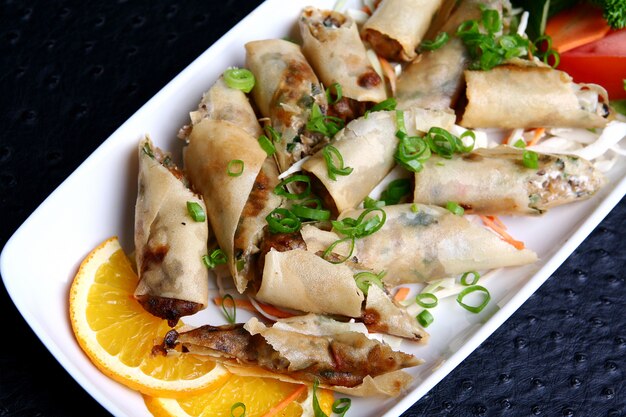 Fritters with meal and vegetables