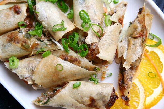 Fritters with meal and vegetables