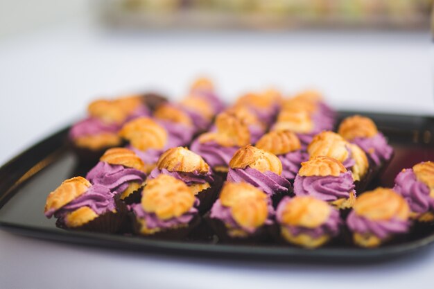 Fritters with purple cream