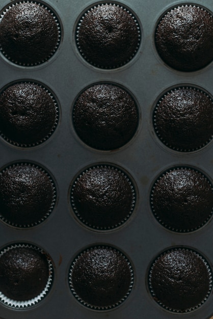 From above chocolate muffins in tin