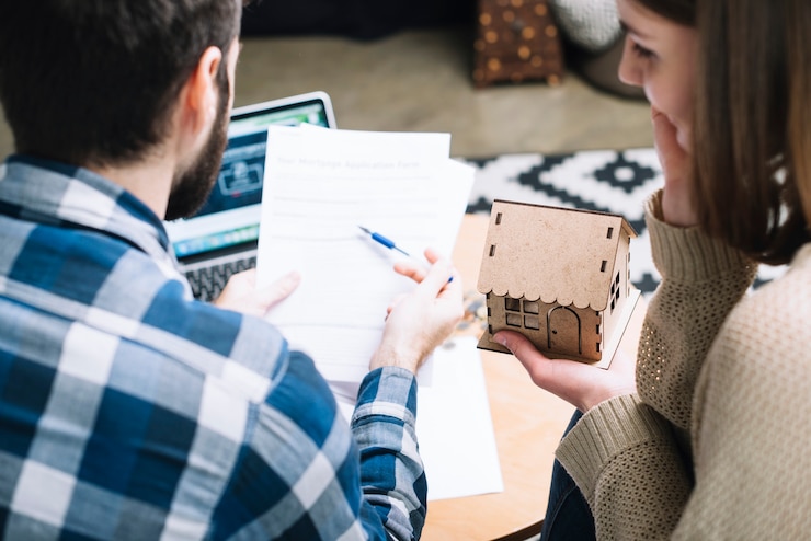 Free Photo from above couple with mortgage agreement