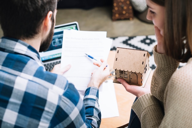 From above couple with mortgage agreement