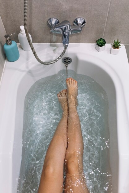 From above legs in bathtub