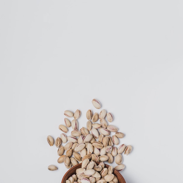 Free photo from above spilled pistachios