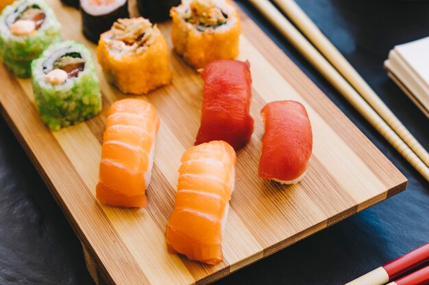 From above sushi on lumber board