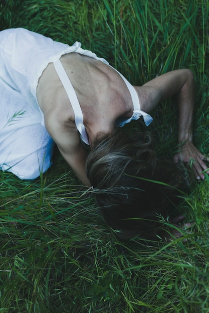 From above woman on grass