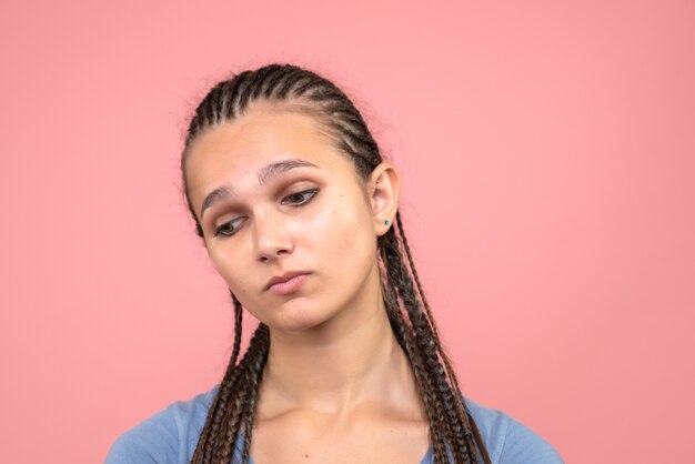 Front close view young girl stressed on pink