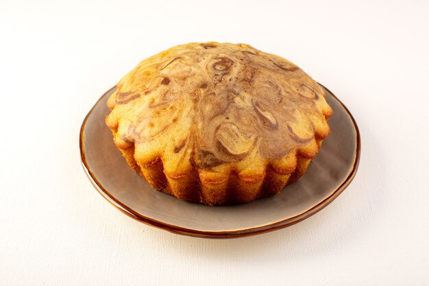 a front closed up view round sweet cake delicious yummy choco cake inside brown plate on the white