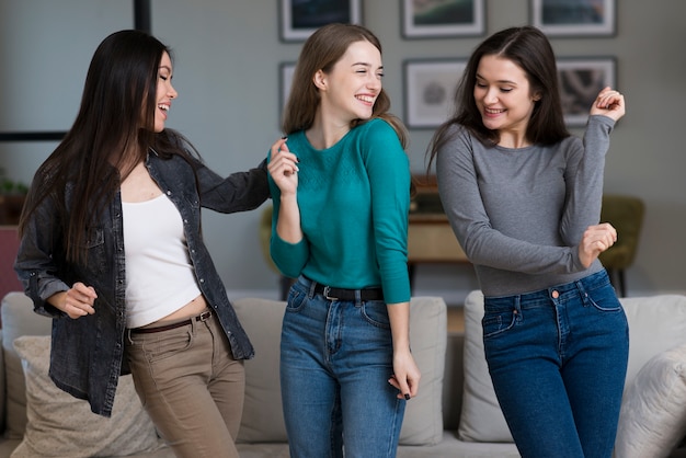 Front view adult females playing together