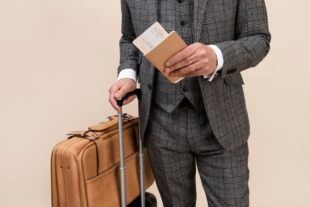 Front view adult holding passport