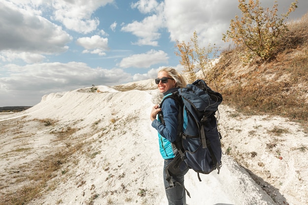 Front view adult woman hiking