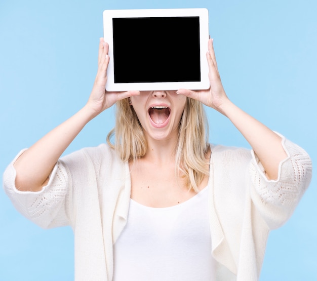 Front view adult woman with a tablet