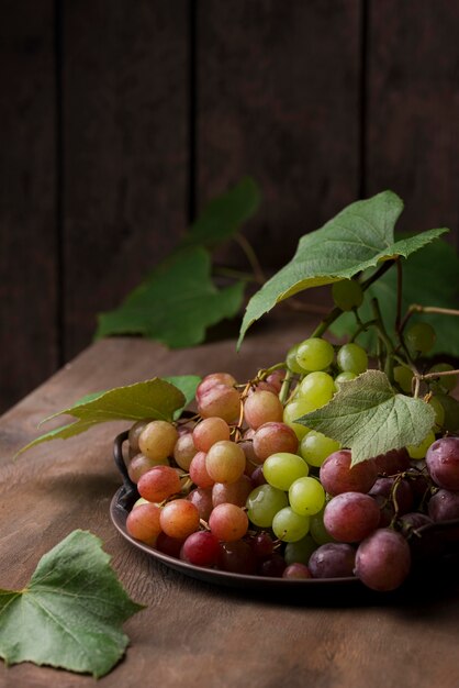 Front view arrangement of autumn fruits with copy space