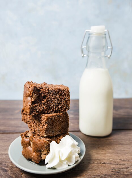 Front view arrangement with cake and milk bottle 