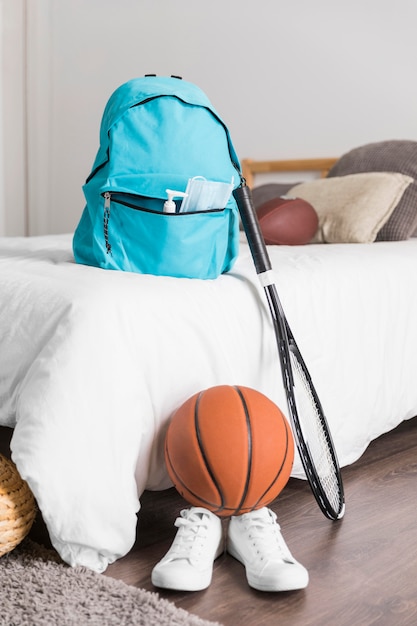 Free photo front view back to school assortment with blue backpack