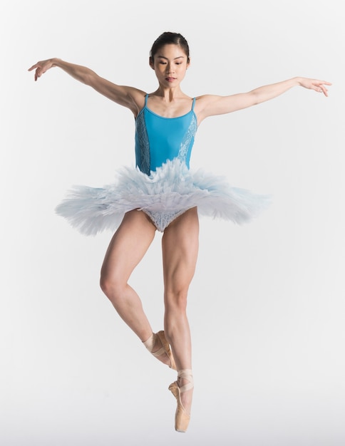 Front view of ballerina in tutu dancing