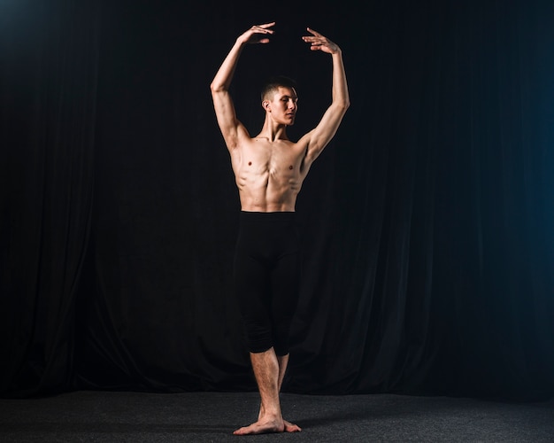 Free photo front view of ballerino in tights posing