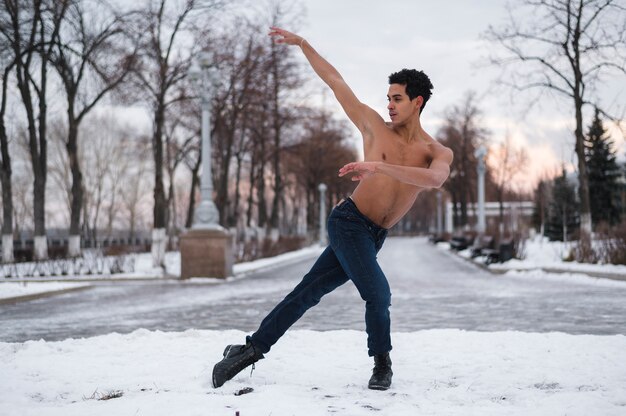 Front view ballet dancer performing outdoor