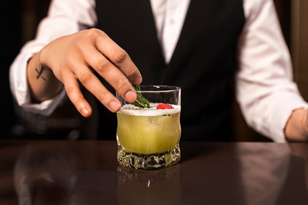 front view bartender preparing drink