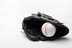 Free photo front view of baseball in glove with copy space