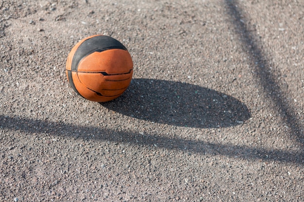 Front view basketball on asphalt