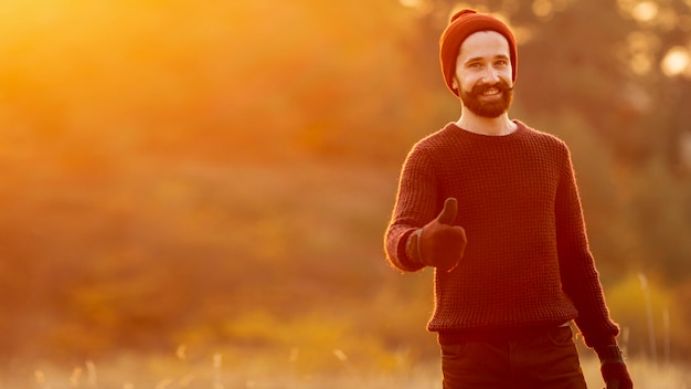 Front view bearded man posing with copy space