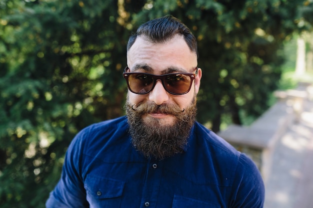 Free photo front view of bearded man smiling