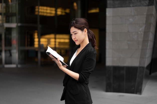 Front view of beautiful business woman