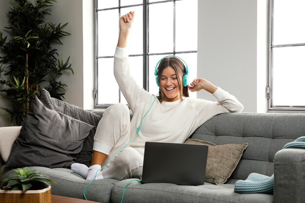 Front view of beautiful woman doing indoor activity