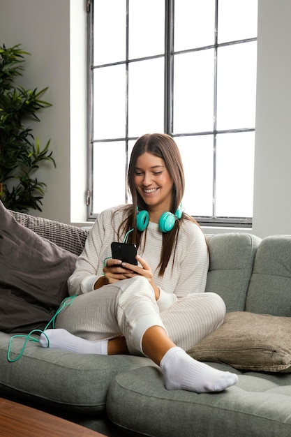 Front view of beautiful woman doing indoor activity