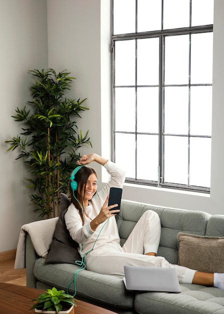 Front view of beautiful woman doing indoor activity