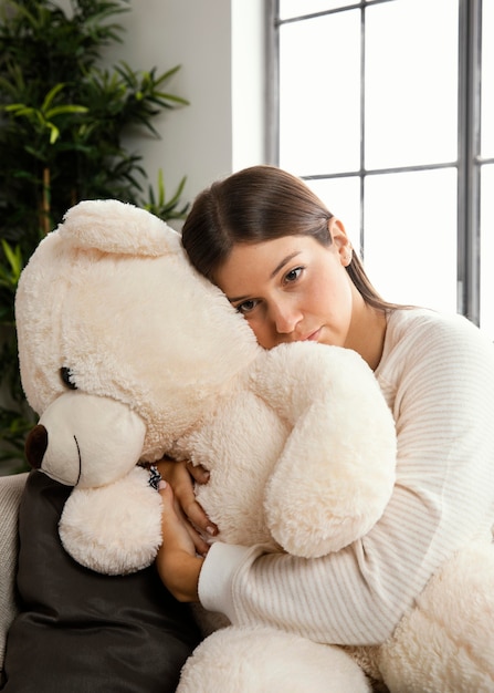 Front view of beautiful woman doing indoor activity