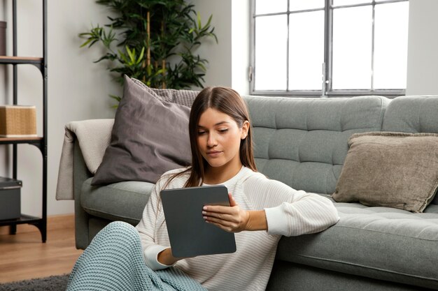 Front view of beautiful woman at home