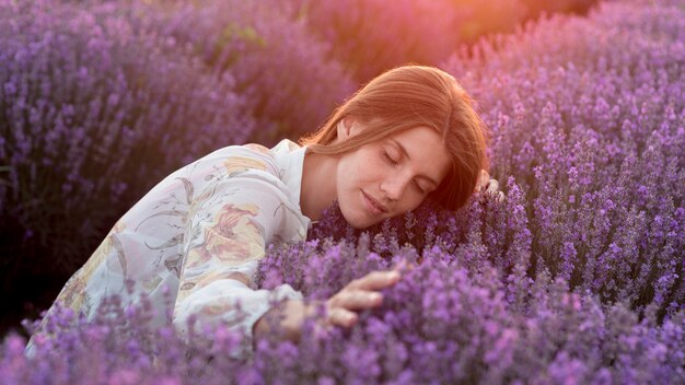 Front view of beautiful woman in nature