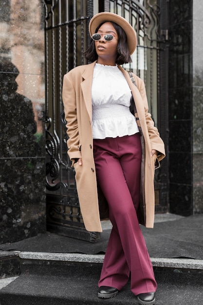 Front view beautiful woman wearing formal clothes outside