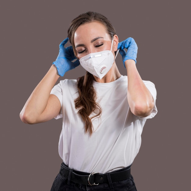 Front view of beautiful woman with face mask