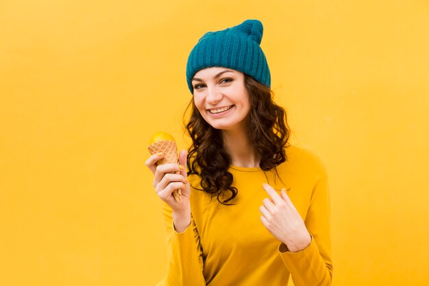 Front view of beautiful woman with ice cream