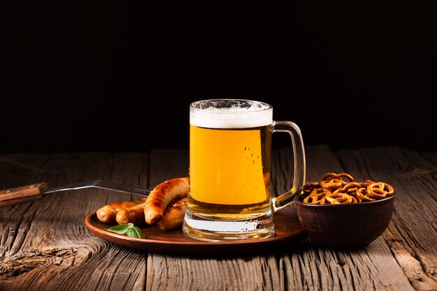 Front view beer mug with sausage