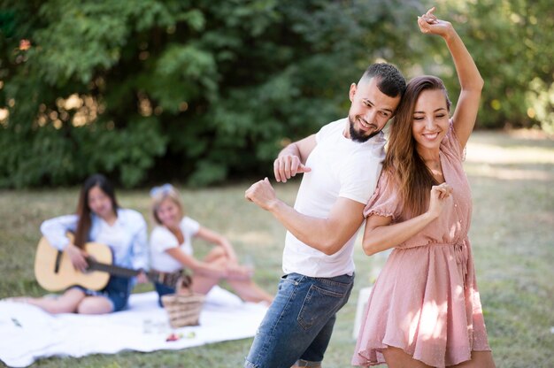 Front view best friends dancing