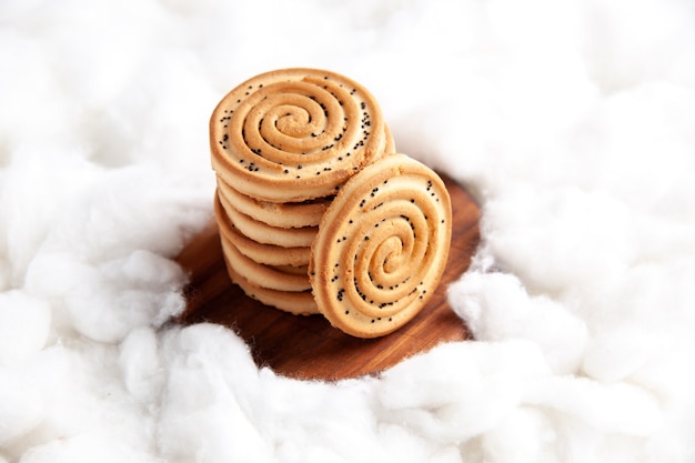 Front view biscuits stacked on top of each other on white background