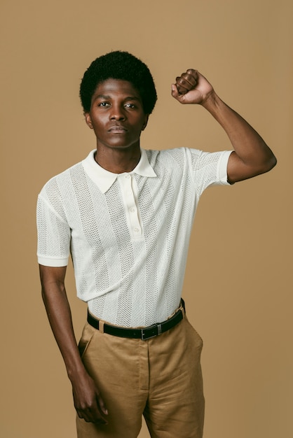 Front view black man posing in studio