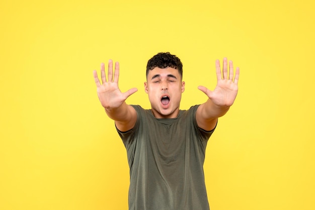 Front view of a blind man stretched his arms forward